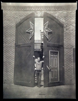 Shane C. Welch Standing near the Sixpoint Door
