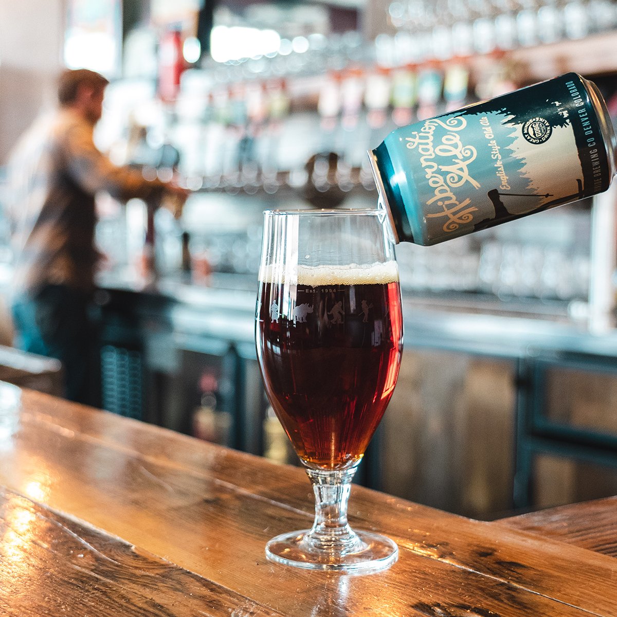 pouring beer into glass