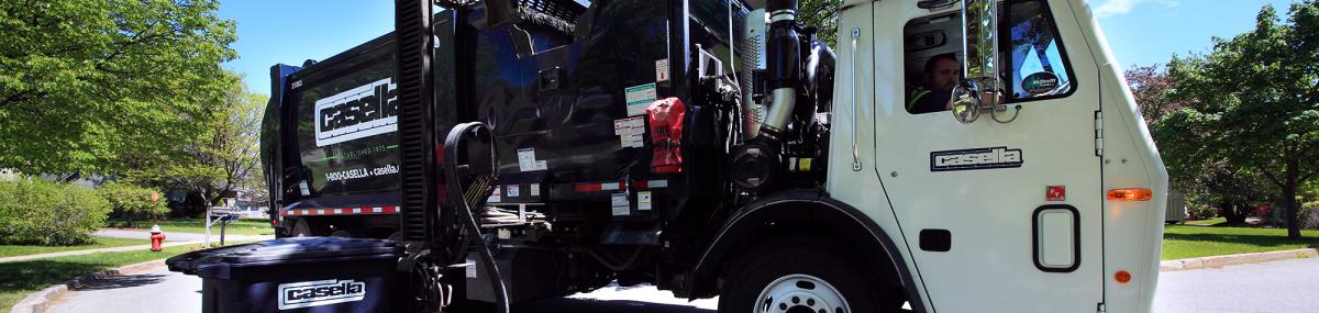 Casella Waste Systems - residential truck picking up trash Casella Waste Systems