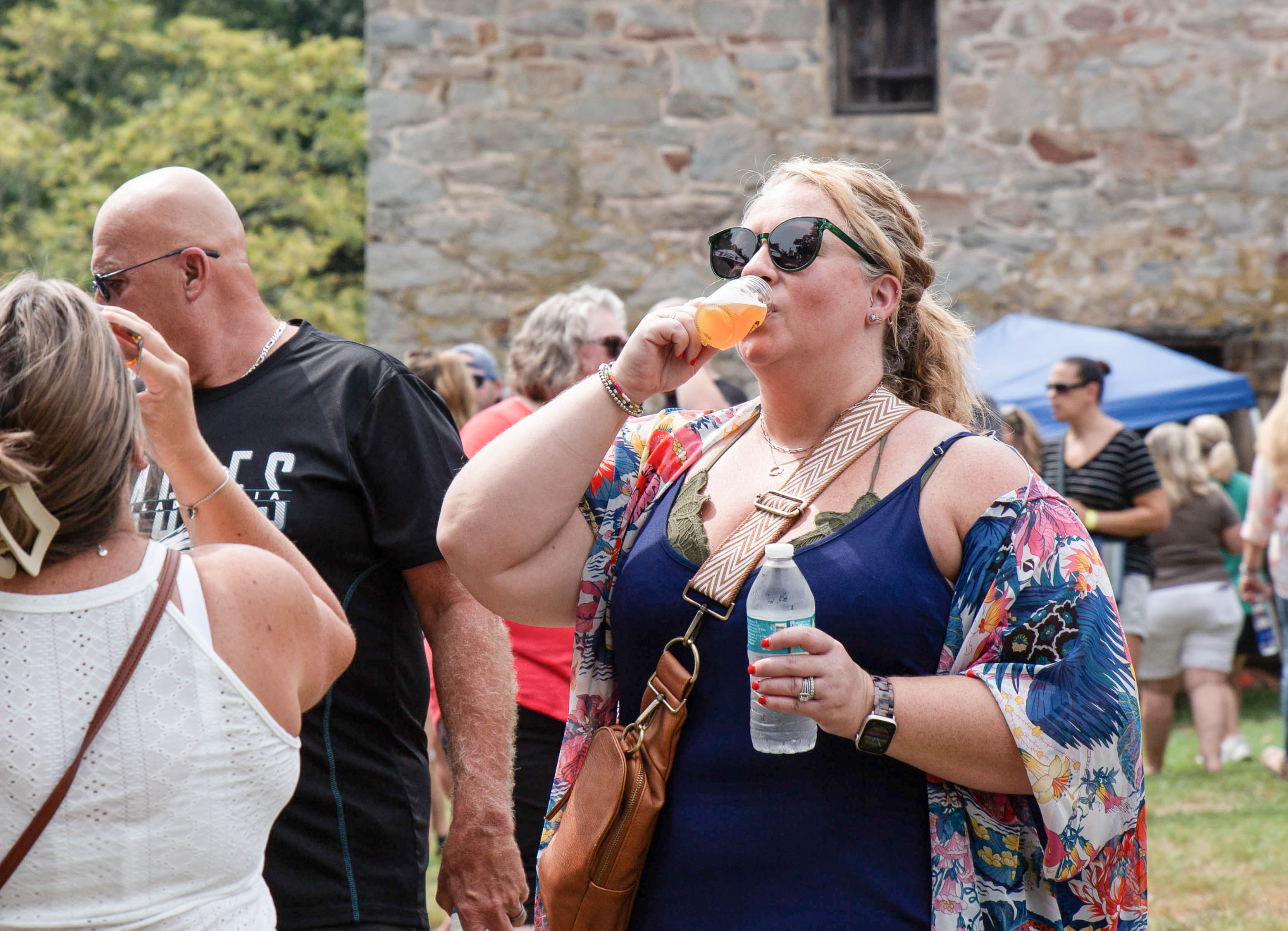 Double fisting on a hot day at the 2023 Odessa Brewfest