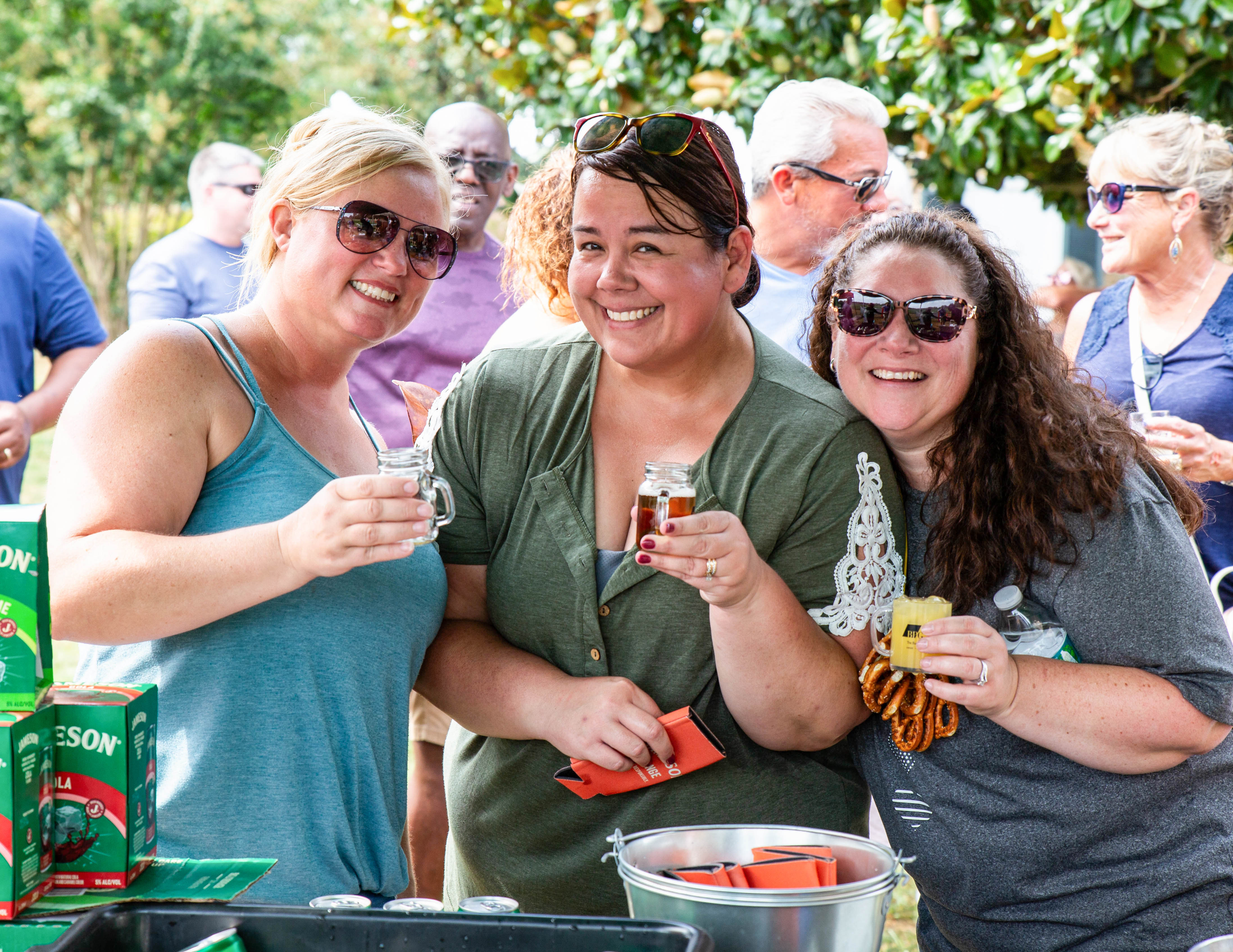 All smiles in the shade at the Historic Odessa Brewfest