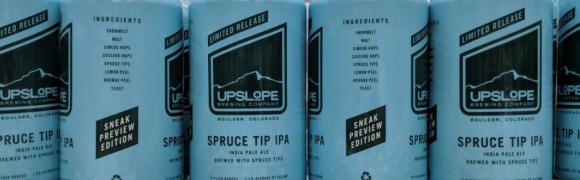Spruce Tip IPA in cans