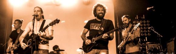 Spokey Speaky on stage in sepia
