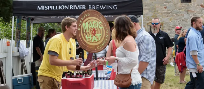 Brewers pour at the Odessa Brewfest