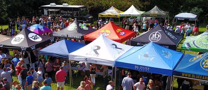 crowds gather around their favorite brewery tents