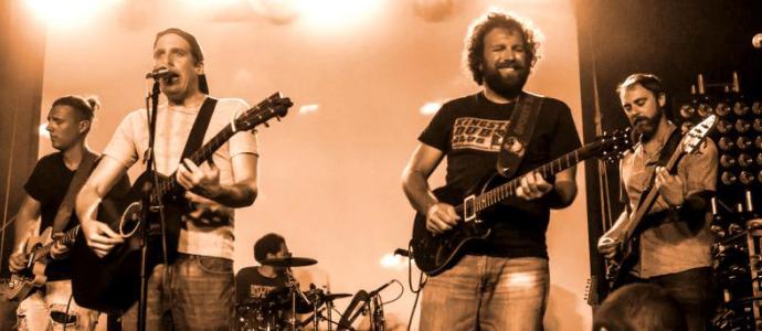 Spokey Speaky on stage in sepia