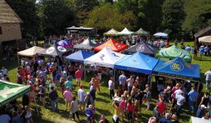 crowds gather around their favorite brewery tents