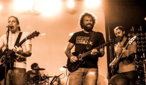 Spokey Speaky on stage in sepia